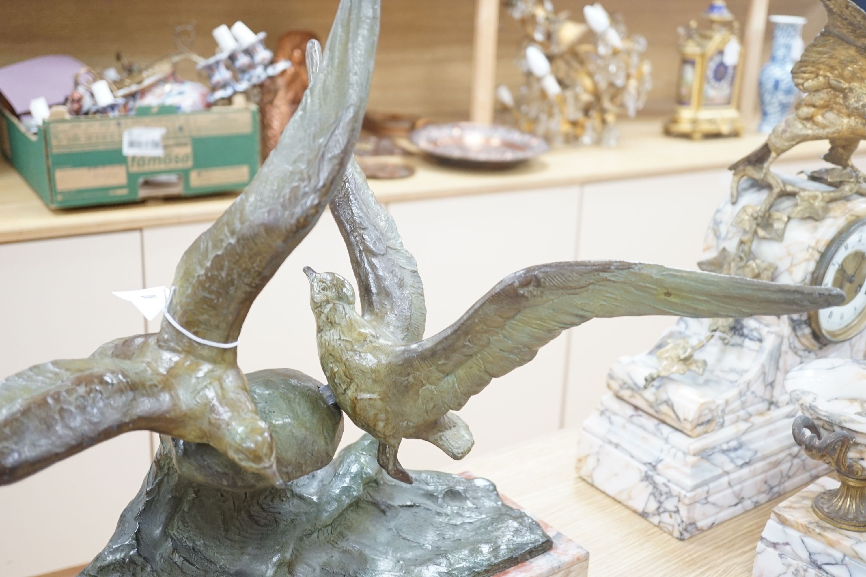 An Art Deco bronzed metal gull and wave group on marble base, signed Rene Papa, 52cm